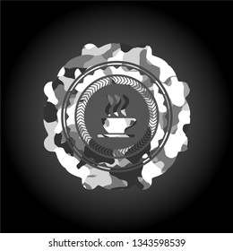 coffee cup icon on grey camouflaged pattern