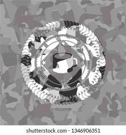 coffee cup icon on grey camo pattern