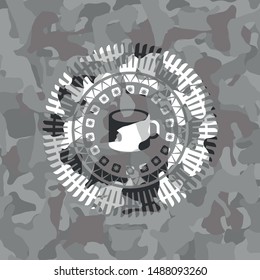 coffee cup icon on grey camo texture
