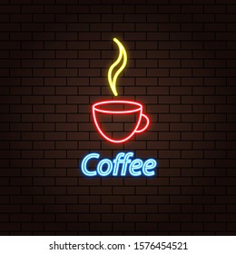 Coffee cup neon effect on a brick background. 