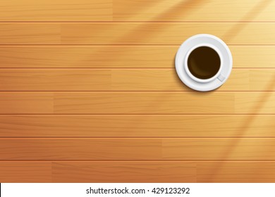 coffee cup on wooden table top view