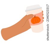 Coffee cups with pumpkin isolated on white background. Hand holding coffee cup. Cup with autumn design. Hello Autumn seasonal concept . 