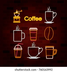 coffee drink set of neon sign on brick wall