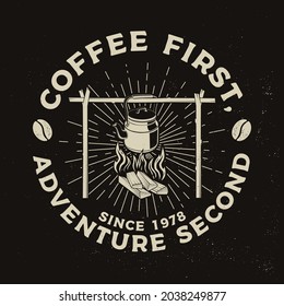 Coffee first, adventure second. Vector illustration. Concept for shirt or logo, print, stamp or tee. Vintage typography design with camping kettle and sunburst silhouette. Camping quote