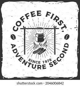 Coffee first, adventure second. Vector illustration. Concept for shirt or logo, print, stamp or tee. Vintage typography design with camping kettle and sunburst silhouette. Camping quote