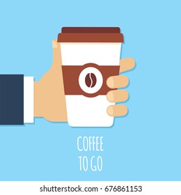 Coffee to go, hand holding  paper cup with coffee on blue background vector illustration