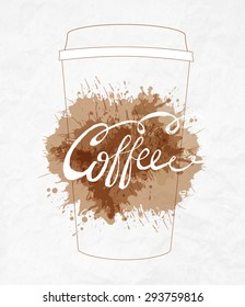 Coffee lettering paper mug with splashes on crumpled paper