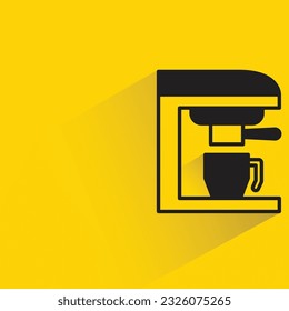 coffee machine with shadow on yellow background