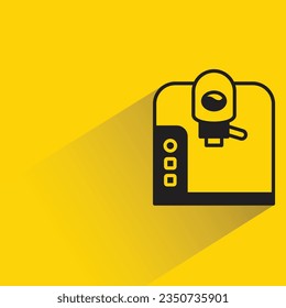 coffee machine with shadow on yellow background
