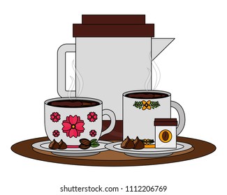 coffee maker and cups with chips chocolate