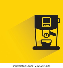 coffee maker with shadow on yellow background