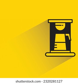 coffee maker with shadow on yellow background