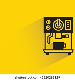 coffee maker with shadow on yellow background