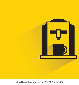 coffee maker with shadow on yellow background