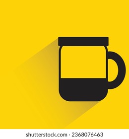 coffee mug with shadow on yellow background