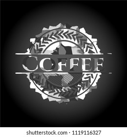 Coffee on grey camouflaged texture