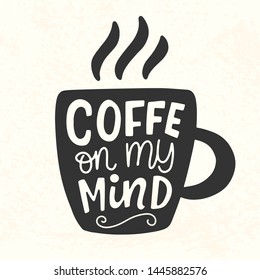 Coffee on my mind quote. Hand Lettering inscription mug, cup black silhouette shape. T shirt design, sticker, banner. Modern calligraphy retro style decoration, typography poster. Vector illustration