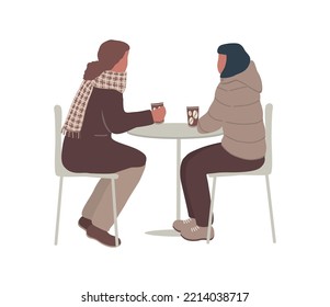 Coffee time. Two women are sitting at the table and drinking coffee in fall or winter. Vector flat illustration.