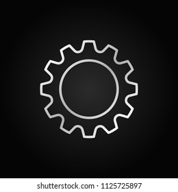 Cog or gear icon. Vector cogwheel linear sign on dark background