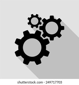 cogwheel gear mechanism icon - black illustration with long shadow