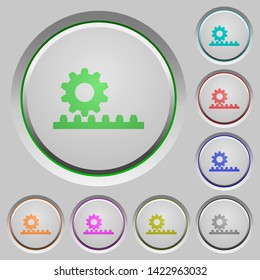 Cogwheel with rack pinion color icons on sunk push buttons