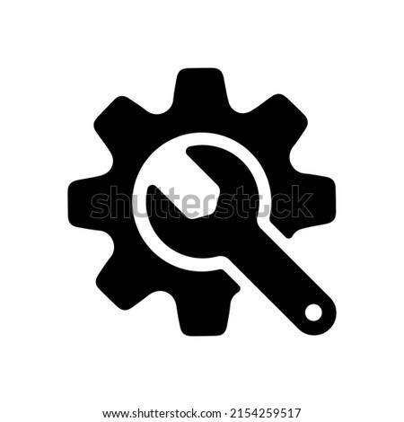 Cogwheel and wrench vector icon illustration