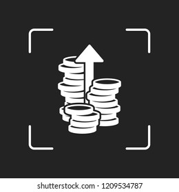 Coins stack, finance grow, up arrow. White object in camera autofocus on dark background