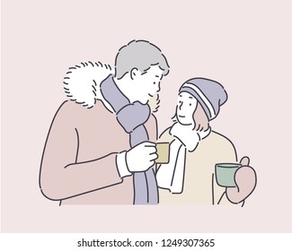 Cold winter A friendly couple drinking a warm drink. hand drawn style vector design illustrations.