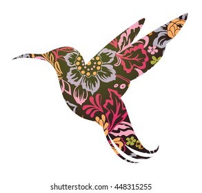 Colibri silhouette shaped into ornamental tattoo