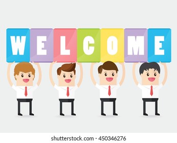 collaborative team work of businessman carrying sign board with word WELCOME