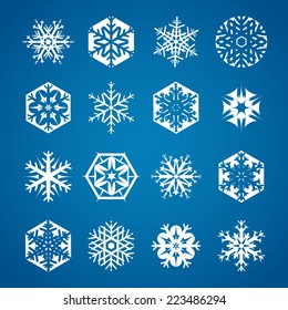 Collection of 16 white snowflakes on blue background
