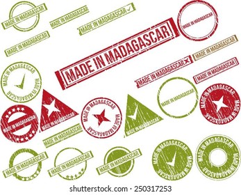 Collection of 22 red grunge rubber stamps with text "MADE IN MADAGASCAR" . Vector illustration