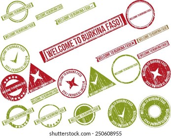 Collection of 22 red grunge rubber stamps with text "WELCOME TO BURKINA FASO". Vector illustration