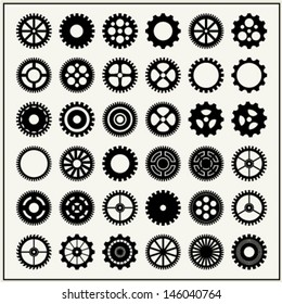 Collection of 36 gear wheels isolated on light background