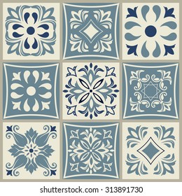 Collection of 9 ceramic tiles in blue and beige