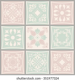 Collection of 9 ceramic tiles in pink and green
