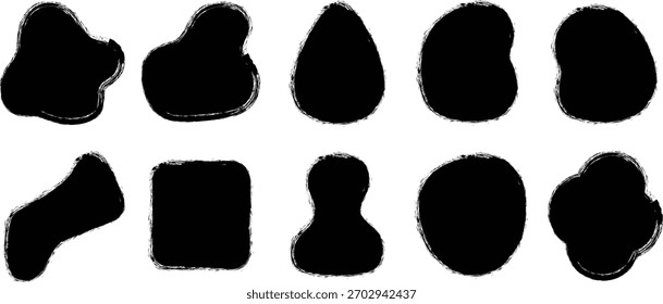 Collection of abstract black ink brush strokes and organic shapes on a white background
