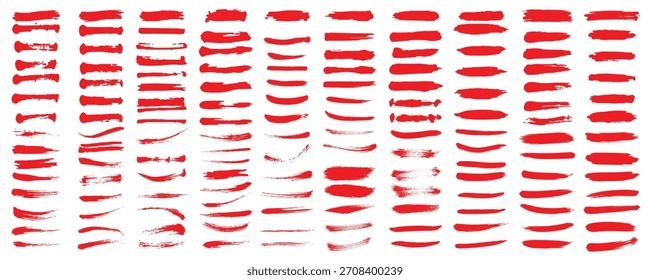 Collection of abstract red brush strokes and paint splatters on a white background