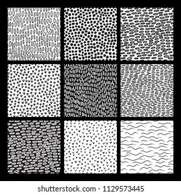 Collection of abstract seamless black and white patterns of hand drawn doodle elements. Scandinavian design style. Nine stylish modern backgrounds set. Vector illustration 