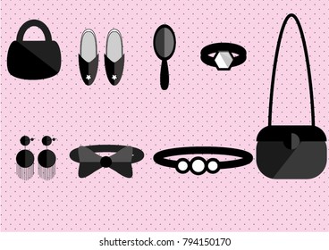 Collection of accessories on a polka dot pink background
