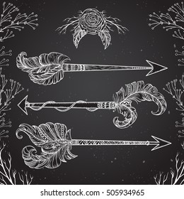 Collection of arrows with tribal indian ornament in boho style on chalkboard background. Isolated elements. Vintage hand drawn vector illustration.