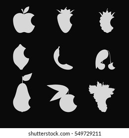 Collection of bitten fruit. White silhouette isolated on black background. Flat icon vector style