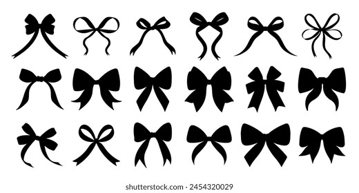 A collection of black bows with varying sizes and shapes. The bows are all black and are arranged in a row