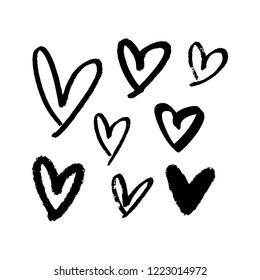 Collection of black brush hearts, vector illustrations. Hand drawn pen and ink painting. Valentine's day romantic elements, grunge style.