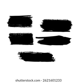 Collection of black brush stroke marks on a white surface