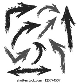 Collection of black and grey painted arrows. Vector set of grunge arrows.Isolated on white background.