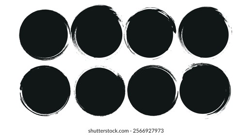 A collection of black grunge circular shapes on a white background, featuring paintbrush style stamps. Includes vector brush circles and distressed round designs. ink brush ellipse circle shape vector