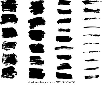 collection of black grunge drop AND spots and brush strokes of different shapes isolated on white in vector for web banner