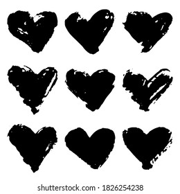 Collection of black grunge paint heart. Set of brush strokes isolated on white background. Vector illustration.