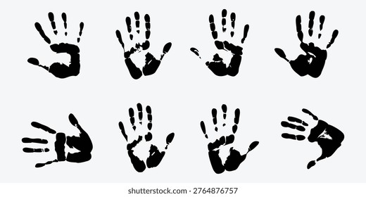 A collection of black handprints on a white background in silhouette mode